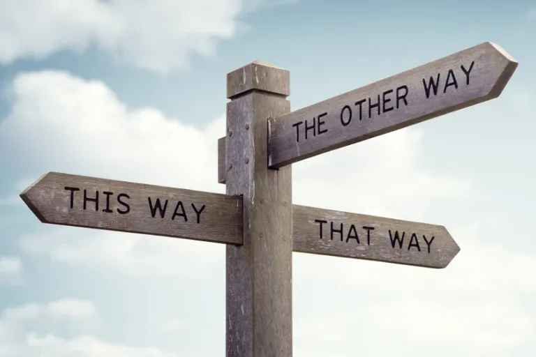Signpost that reads "this way, that way, the other way"